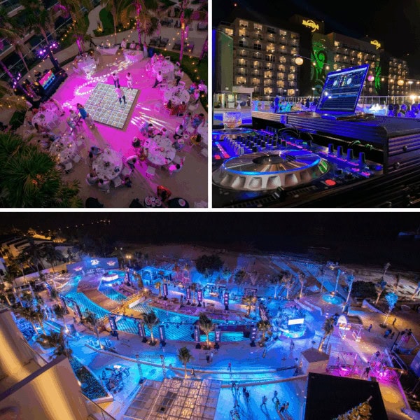 Vibrant outdoor wedding reception at night with pink lighting and live entertainment.