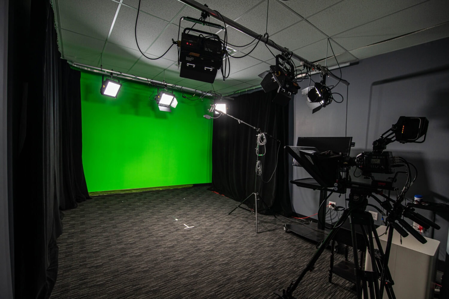 Studio green screen setup for high-quality video production by Mills James, professional event production company.